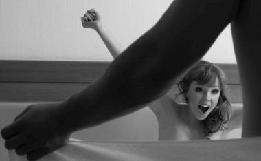 The woman is surprised by member of the member's size with the help of soda