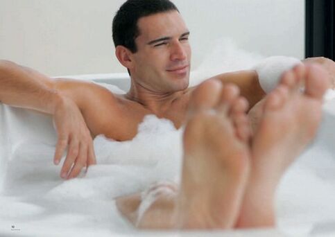 a man takes a baking soda bath to enlarge his penis